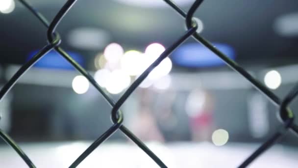 Iron mesh cage MMA. Close-up. — Stock Video