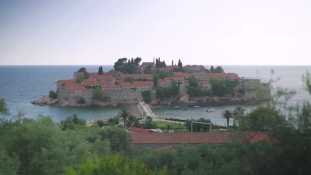 Sveti Stefan is a tourist town by the sea. Montenegro. Day — ストック動画