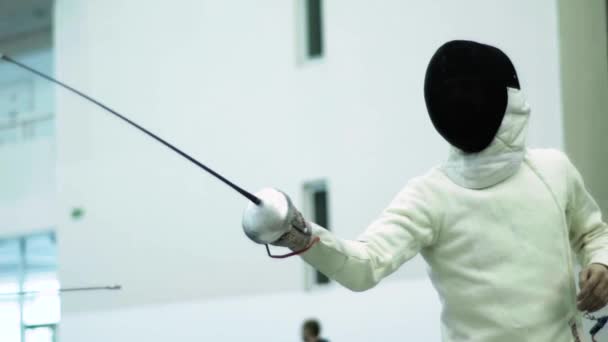 Fencing. Fencer during a duel. Slow motion. Kyiv. Ukraine — ストック動画