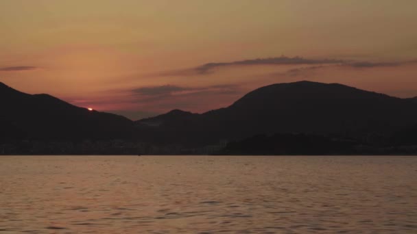 Seascape in the evening at sunset. Mountains and the sea. Montenegro — Stock Video