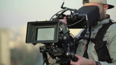 Çekim sırasında kamera. Film yapımcılığı. Çekim. Film yapımcılığı.