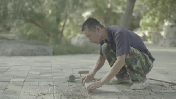 Trabajador callejero. Beijing. De China. Países Bajos — Vídeo de stock