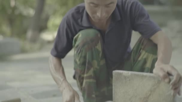 Férfi utcai munkás. Peking. Kína. Ázsia — Stock videók