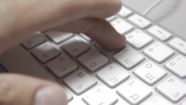 Hands are typing on a macbook keyboard. Close-up — Stock Video