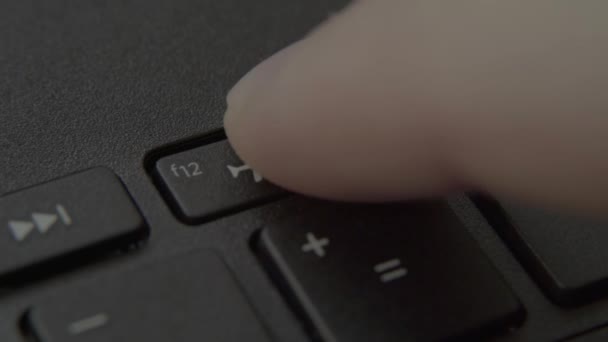 The finger presses the "Airplane" button on the keyboard — Stock Video