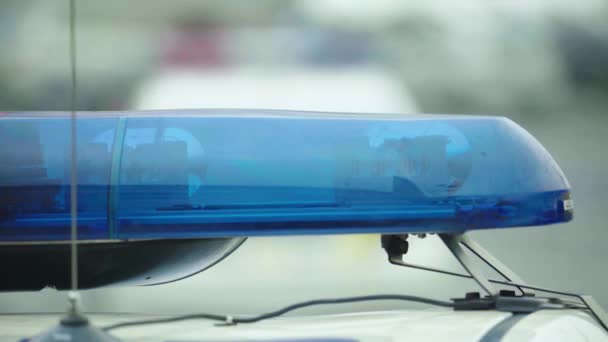 Flashing flasher on the roof of a police car. Blinker. Close-up. — Stock Video