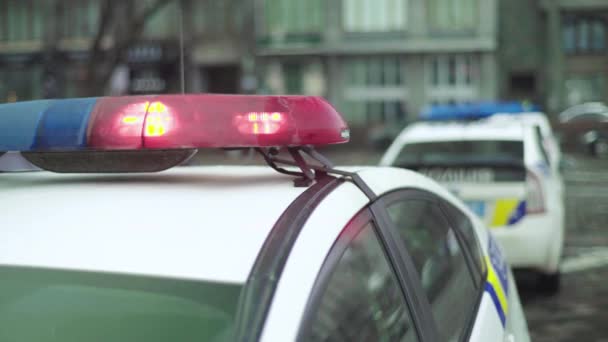 Flashing flasher on the roof of a police car. Blinker. Close-up. — Stock Video