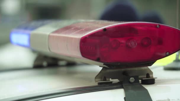 Flashing flasher on the roof of a police car. Blinker. Close-up. — Stock Video