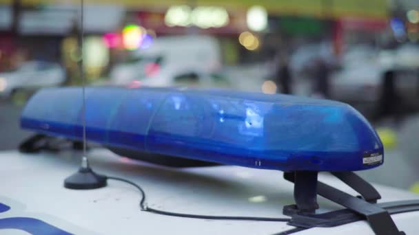 Flashing flasher on the roof of a police car. Blinker. Close-up. — Stock Video