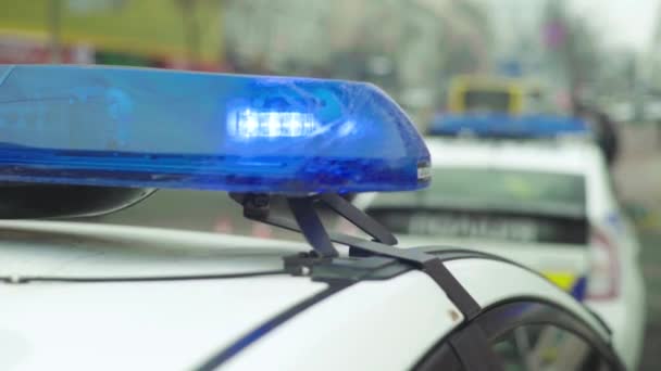 Flashing flasher on the roof of a police car. Blinker. Close-up. — Stock Video