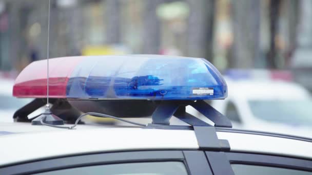 Flashing flasher on the roof of a police car. Blinker. Close-up. — Stock Video