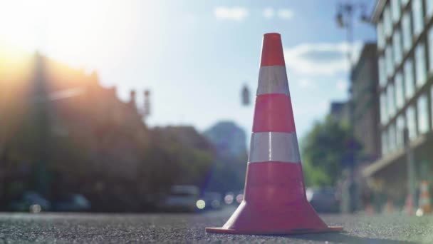 Police cone on the road. Place of accident. Transport. Road traffic. Sign. Kyiv. — ストック動画