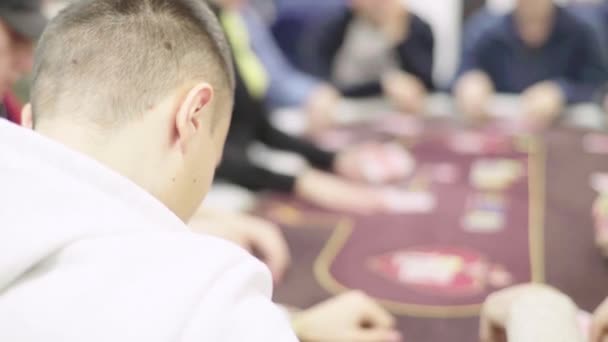 Playing poker in a casino. Gambling — Stock Video