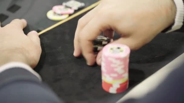 Chips while playing poker in a casino. Close-up. Gambling — ストック動画
