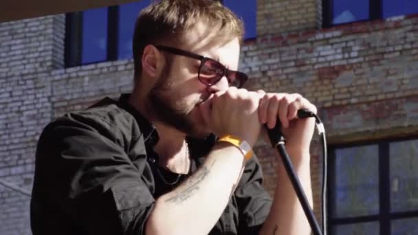 Male singer on stage during a concert. Kyiv. Ukraine — Stock Video