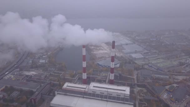 Smoke comes from the chimney. Aerial. Air pollution. Ecology. Kyiv. Ukraine. — ストック動画