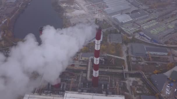 Smoke comes from the chimney. Aerial. Air pollution. Ecology. Kyiv. Ukraine. — ストック動画