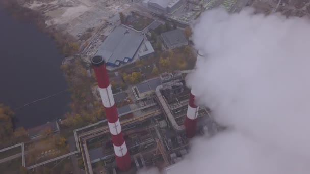 Smoke comes from the chimney. Aerial. Air pollution. Ecology. Kyiv. Ukraine. — ストック動画