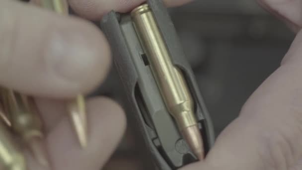 Cartridges charge. Close-up. Slow motion — Stock Video