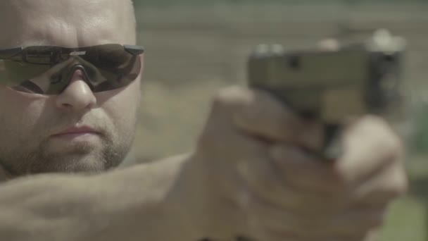 Pistol shooting. Slow motion. Close-up. — Stock Video