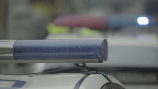 Flashing flasher on the roof of a police car. Blinker. Close-up. — Stock Video