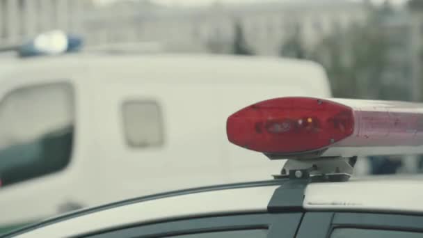 Flashing flasher on the roof of a police car. Blinker. Close-up. — Stock Video