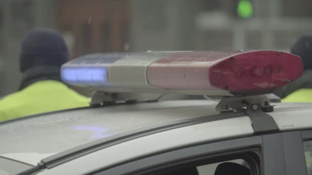 Flashing flasher on the roof of a police car. Blinker. Close-up. — Stock Video