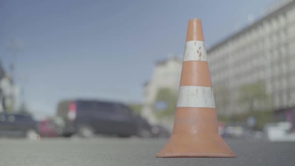 Police cone on the road. Place of accident. Transport. Road traffic. Sign. Kyiv. — Stock Video