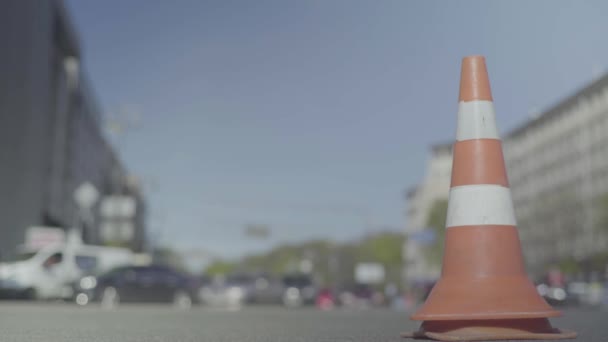 Police cone on the road. Place of accident. Transport. Road traffic. Sign. Kyiv. — ストック動画