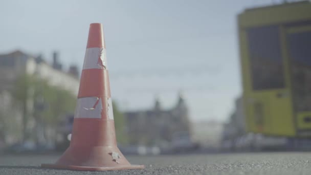 Police cone on the road. Place of accident. Transport. Road traffic. Sign. Kyiv. — Stock Video