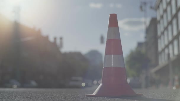 Police cone on the road. Place of accident. Transport. Road traffic. Sign. Kyiv. — ストック動画