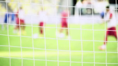 Stadyumda futbol oyuncularını çalıştırmak. Isınmaya başla. Olimpiyskiy. Kyiv. Ukrayna