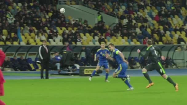 Football soccer game at the stadium. Slow motion. Olimpiyskiy. Kyiv. Ukraine. — ストック動画