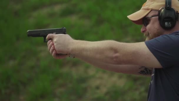 Pistol shooting. Slow motion. Close-up. — Stock Video