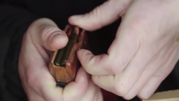 Cartridges charge bullet. Close-up. Shooting — Stock Video