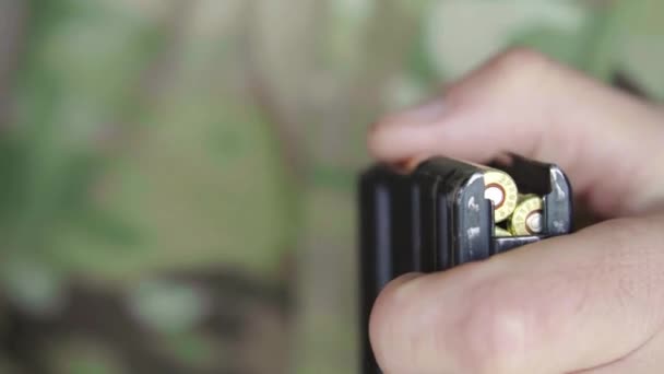 Cartridges charge bullet. Close-up. Shooting — Stock Video