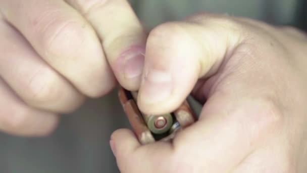 Cartridges charge. Close-up. Slow motion — Stock Video