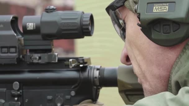 Shooter with a rifle while shooting — Stock Video