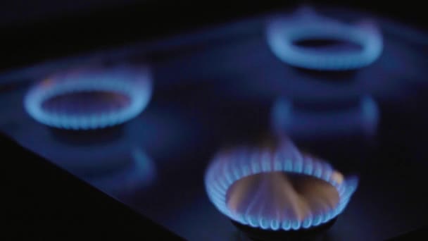 Close-up of a fire in a gas stoker on a gas stove — Stock Video