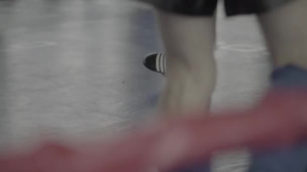 Kickboxing. Kickboxer legs during the fight. Feet — Stock Video