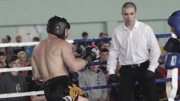 Kickboxing. The fight in the ring. Competition. Kyiv. Ukraine. Slow motion — Stock Video