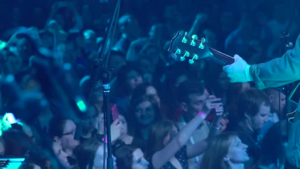 Guitarist plays electric guitar on stage. Slow motion. Kyiv. Ukraine — 비디오