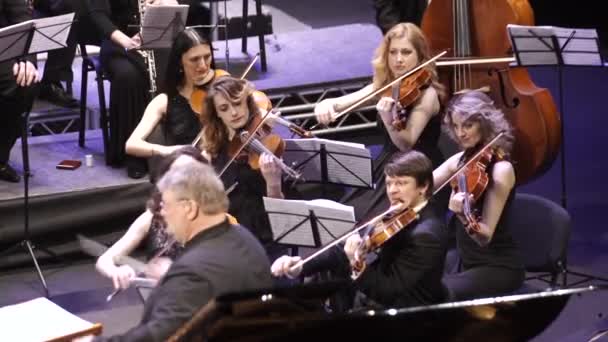 Musicians play in the orchestra on stage. Kyiv. Ukraine — Stock Video