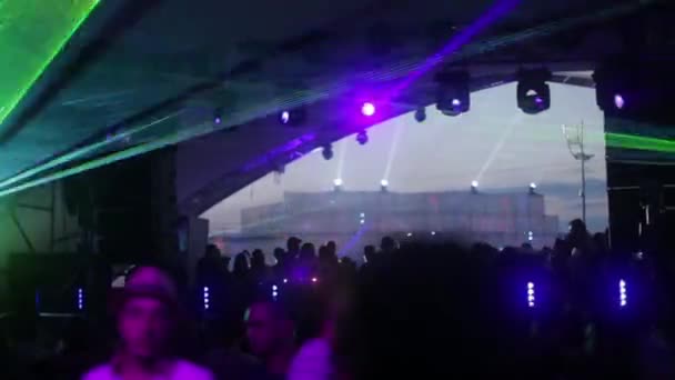 People in a disco at night. Party. Dance floor. Festival. Joy. — Stock Video