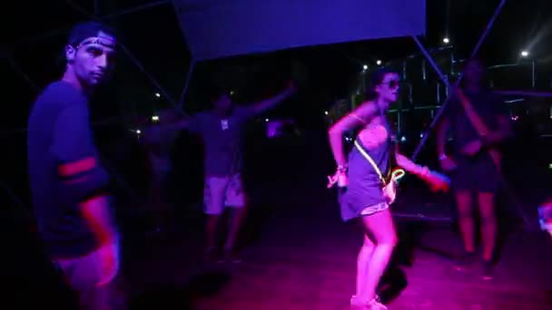 Girl at the disco at night. Party. Dance floor. Festival. Joy. — ストック動画