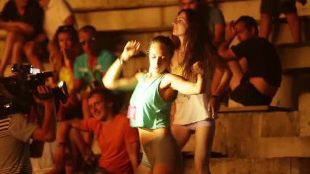 Girl at the disco at night. Party. Dance floor. Festival. Joy. — Stock Video