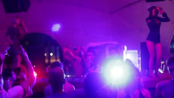 DJ plays music at the party. Disco. Festival. Joy. — ストック動画