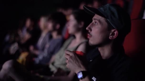 People watch a movie in the cinema hall. Friends. Life style. — Stockvideo