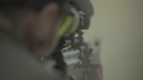 Rifle in the hands of a shooter during shooting. Slow motion. Close-up. — Stock Video