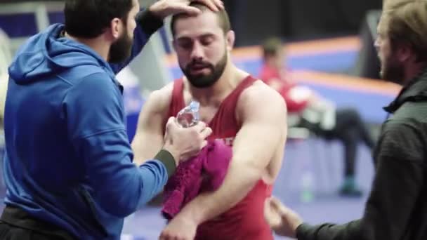 Coach and athlete during break wrestling competitions. Kyiv. Ukraine — Stock Video